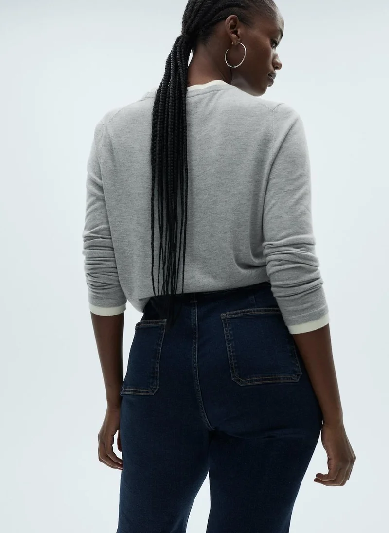 مانجو جينز قصير واسع بخصر مرتفع وجيوب